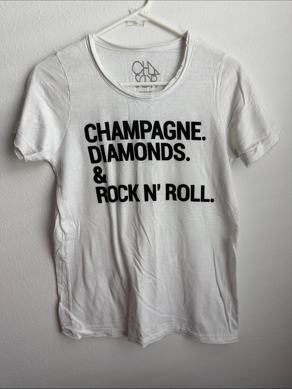 Chaser White Graphic Tee With Black Text "Champagne. Diamonds. & Rock N' Roll."